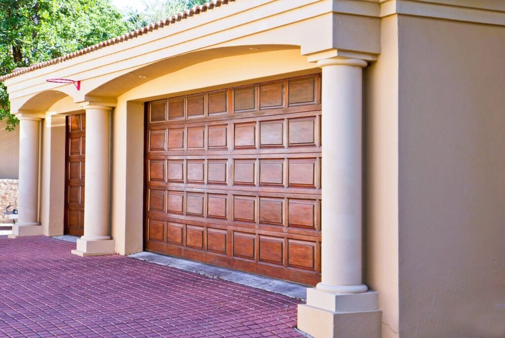 Emergency garage door repair services on a residential home in Anderson, Indiana.